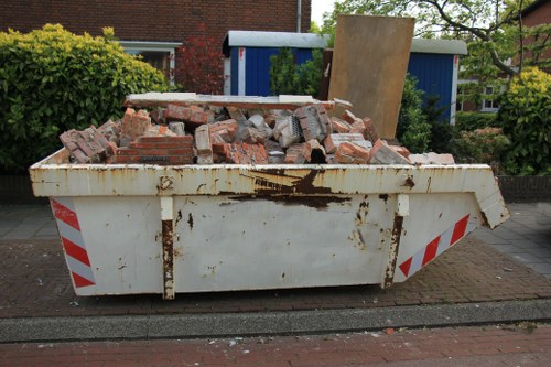 Skip container for waste disposal in Shadwell
