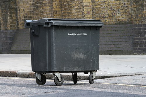 Secure waste management with enclosed skips